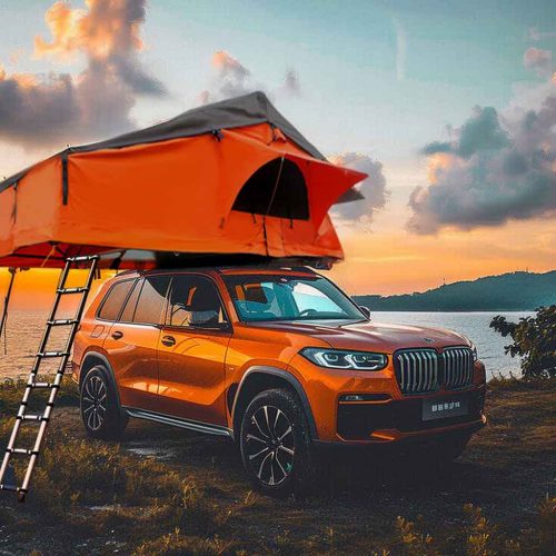 Soft top long roof tent-11 Rooftop tent camping on the beach under the setting sun