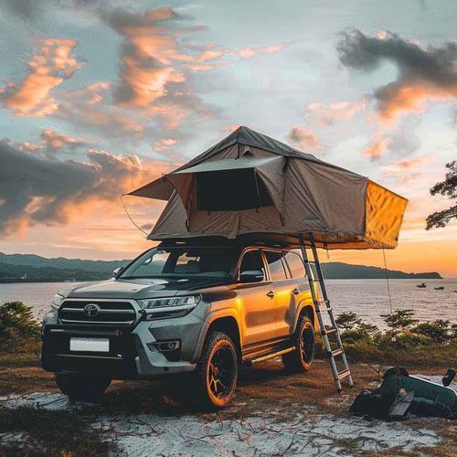 Soft top long roof tent-13 Rooftop tent camping on the beach under the sunset