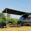 Outdoor camping under the car side tent, close to nature, and enjoy leisurely